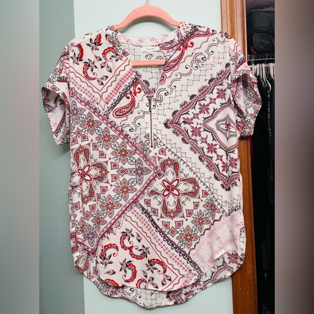 Blouse xs on tag but will fit to medium. Soft and flowy